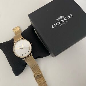Gold Coach women’s grand watch with Mesh band